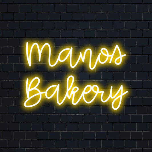 Manos Bakery Personalized Neon Light with neon text light on black brick background