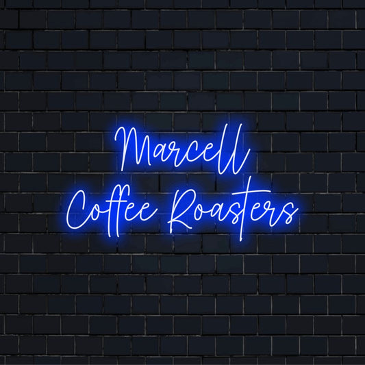 Marcell Coffee Roasters Custom Name Neon Sign, neon text light against brick backdrop