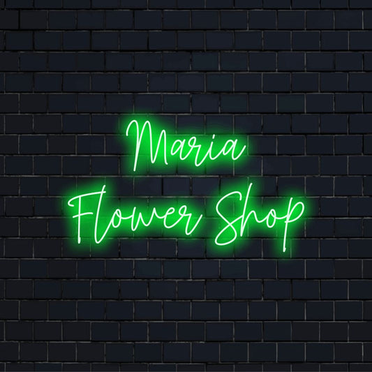 Maria Flower Shop Custom Name Neon Sign, glowing wall decor on dark brick wall