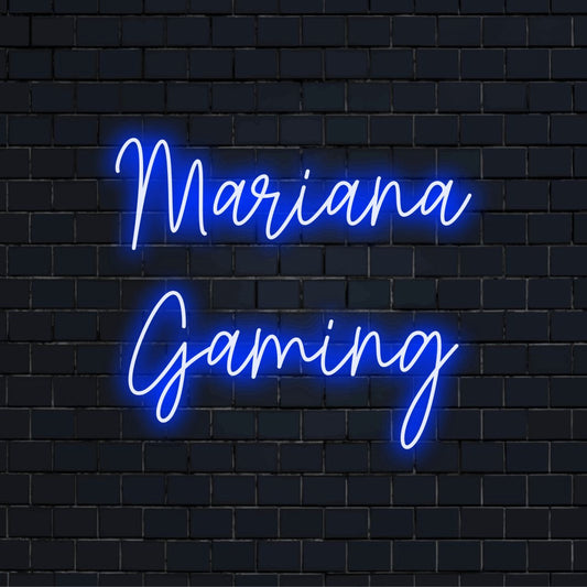 Mariana Gaming Personalized Neon Light with glowing lettering against black brick wall