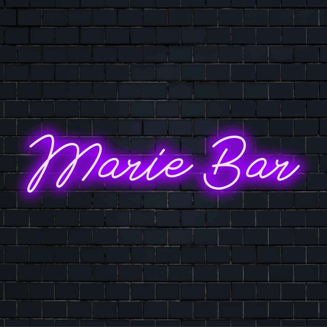 Marie Bar Personalized LED Neon Sign, bright neon lettering against black brick wall