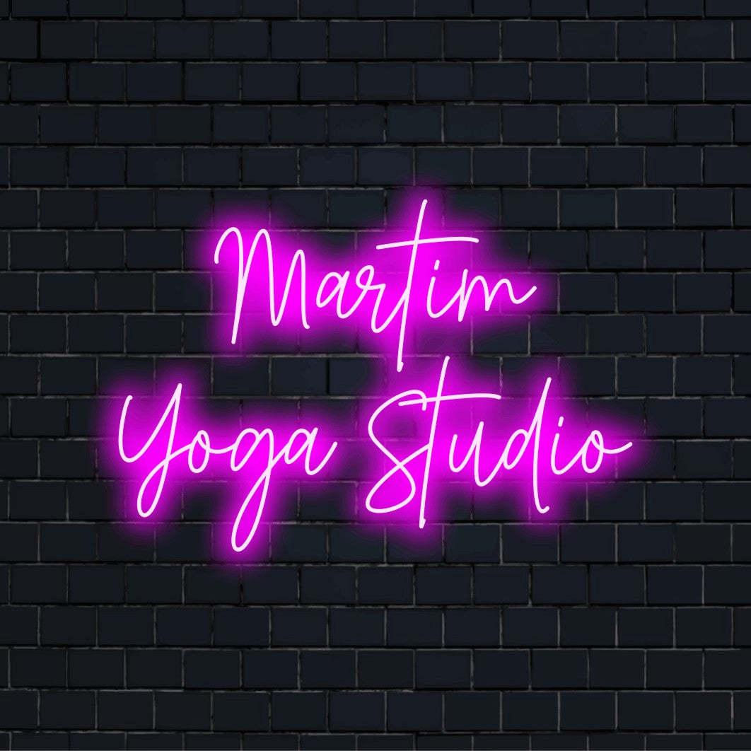 Martim Yoga Studio Personalized LED Neon Sign, bright neon lettering on dark brick background