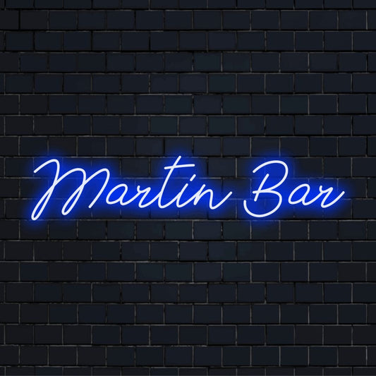 Martin Bar Personalized Neon Light with neon text light against brick backdrop