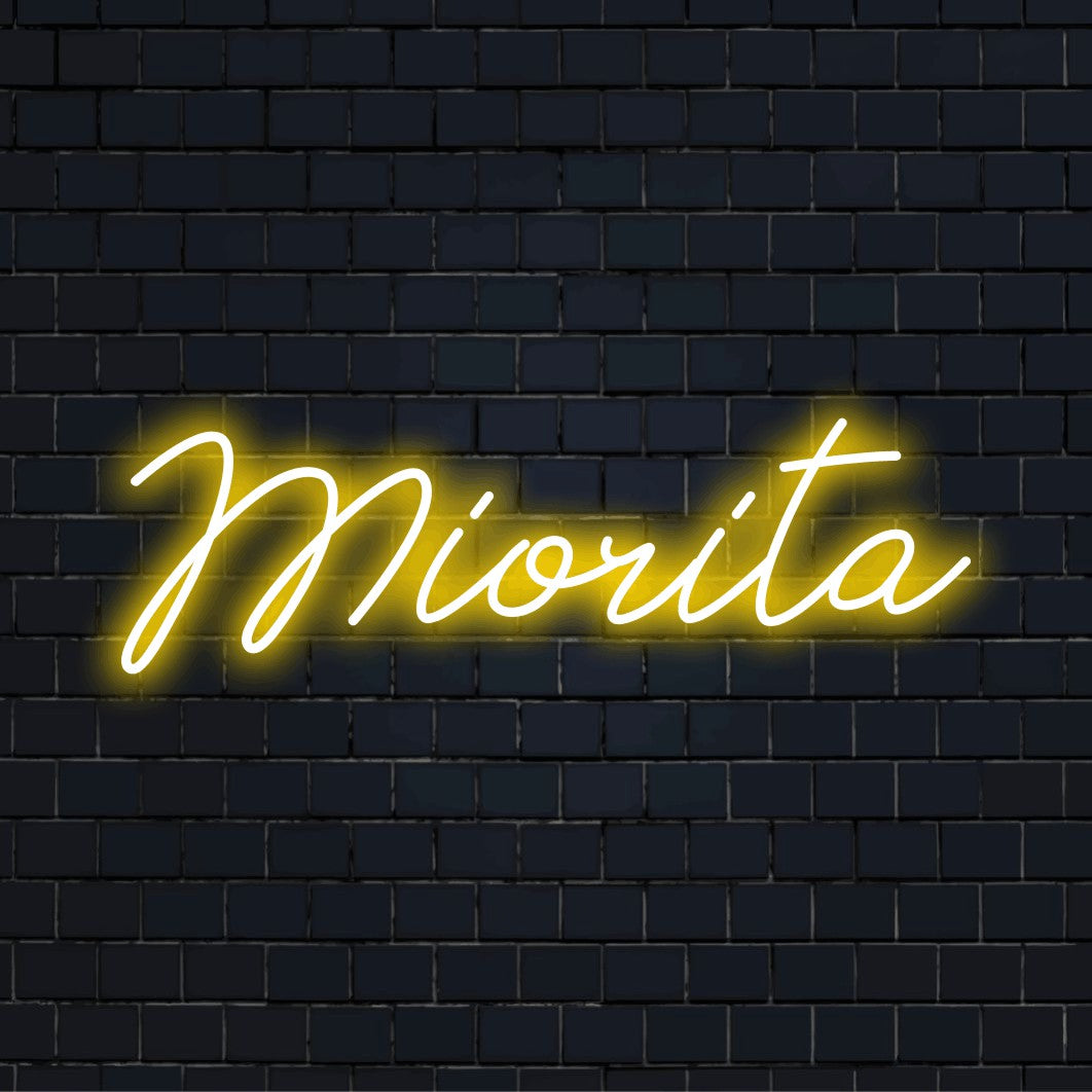 Miorita Neon Light with neon text light on black brick background