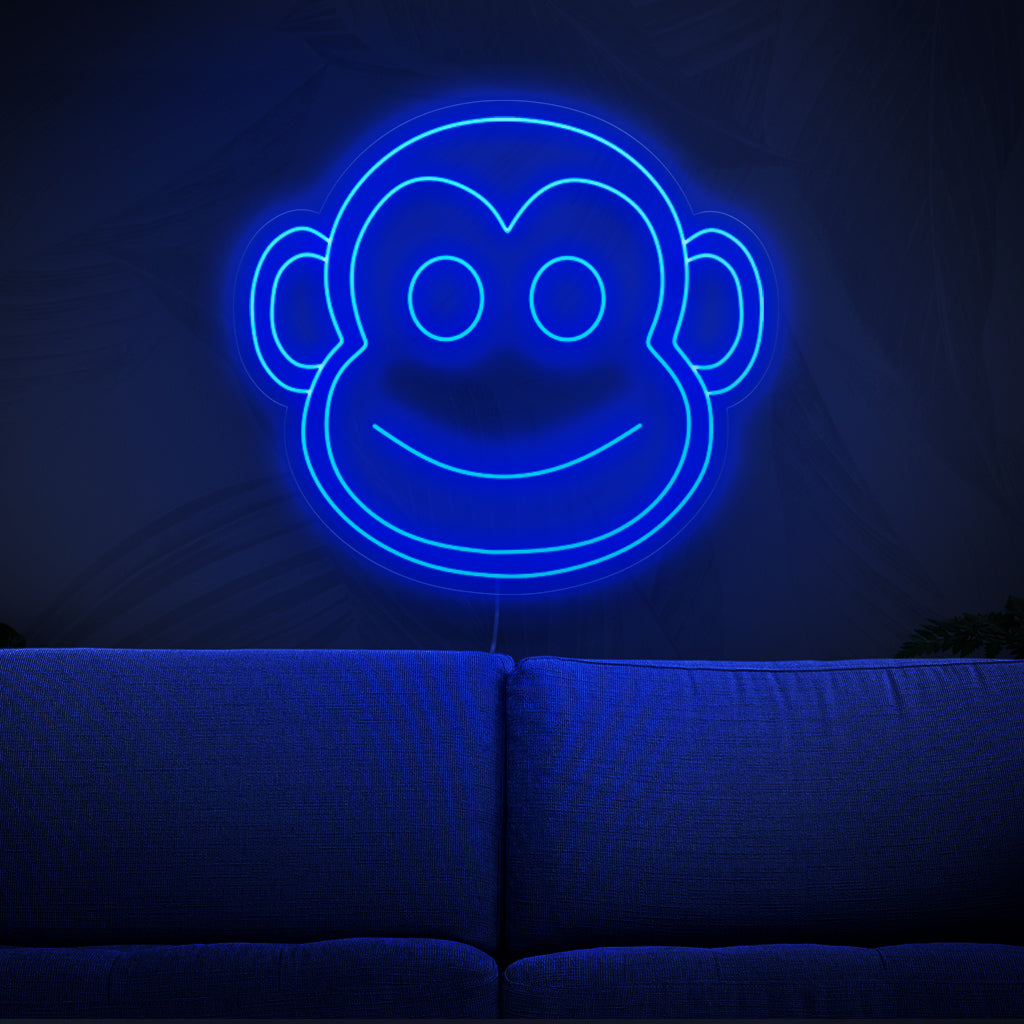 The monkey neon sign is a playful addition to animal-themed decor, emanating a lively and energetic light.