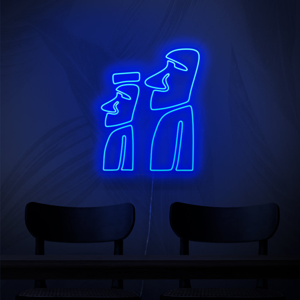 An enchanting neon sign featuring the Monuments of Moai, iconic stone statues from Easter Island. 