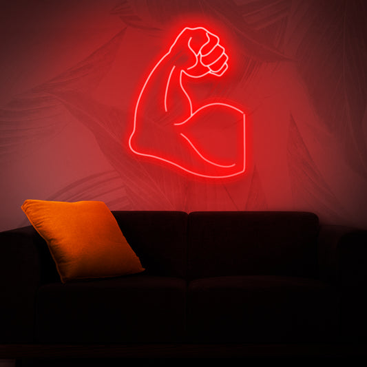 A striking neon sign showcasing a muscular arm, representing strength, power, and fitness.