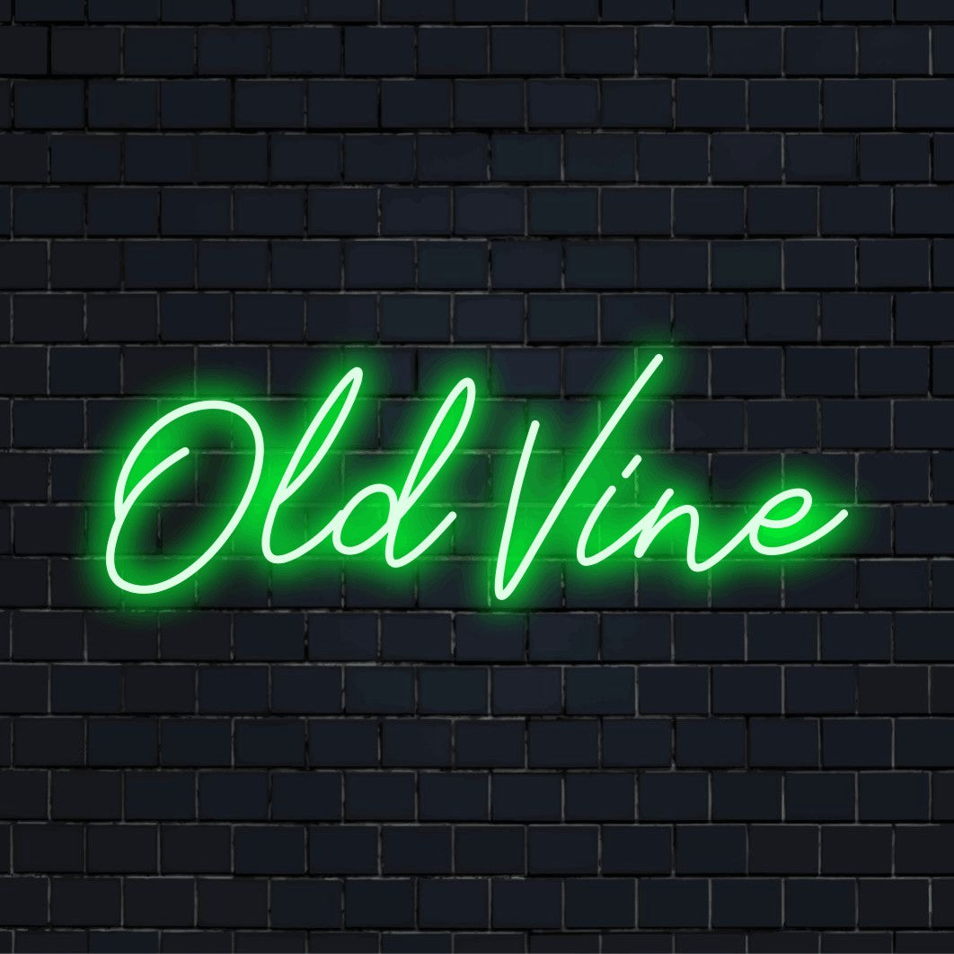 Old Vine LED Neon Sign, glowing wall decor on black brick background