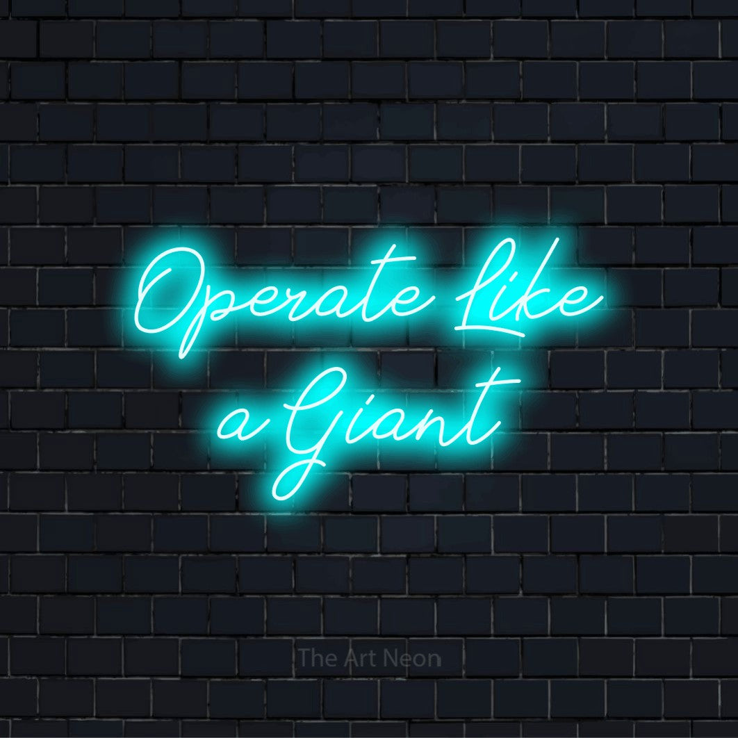 "Operate Like A Giant" glowing LED neon sign on a black brick wall