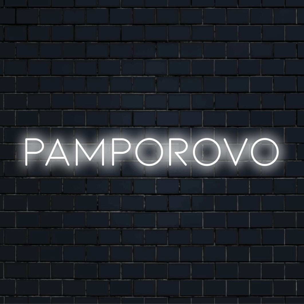 Pamporovo LED Neon Sign, glowing neon text on dark brick background