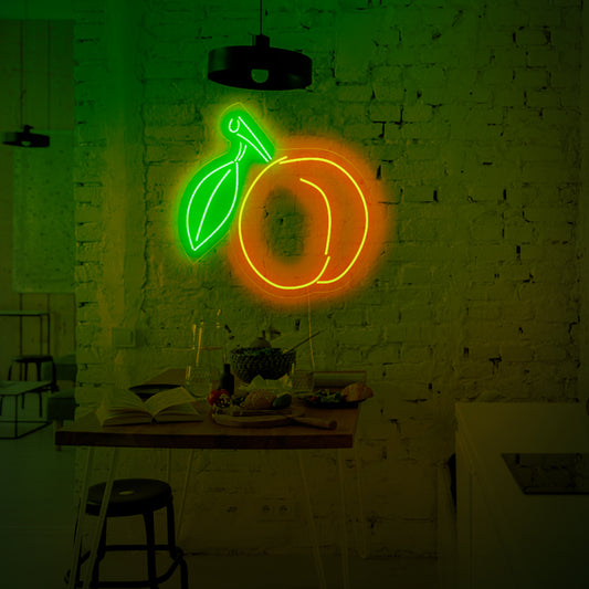 A delightful neon sign showcasing a vibrant peach, radiating freshness and the essence of summer. 