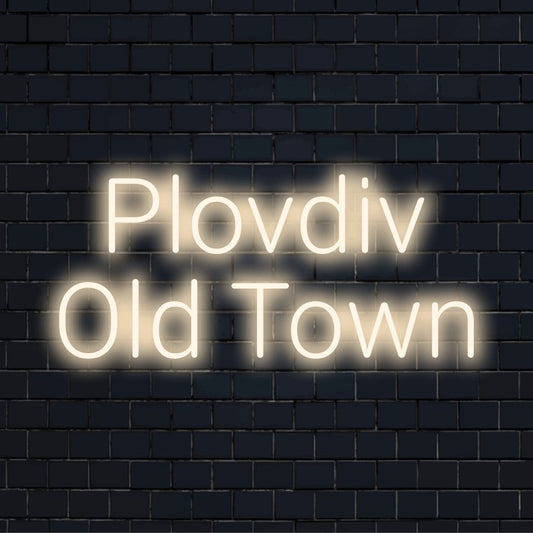 Plovdiv Old Town Neon Sign, glowing neon text on black brick background