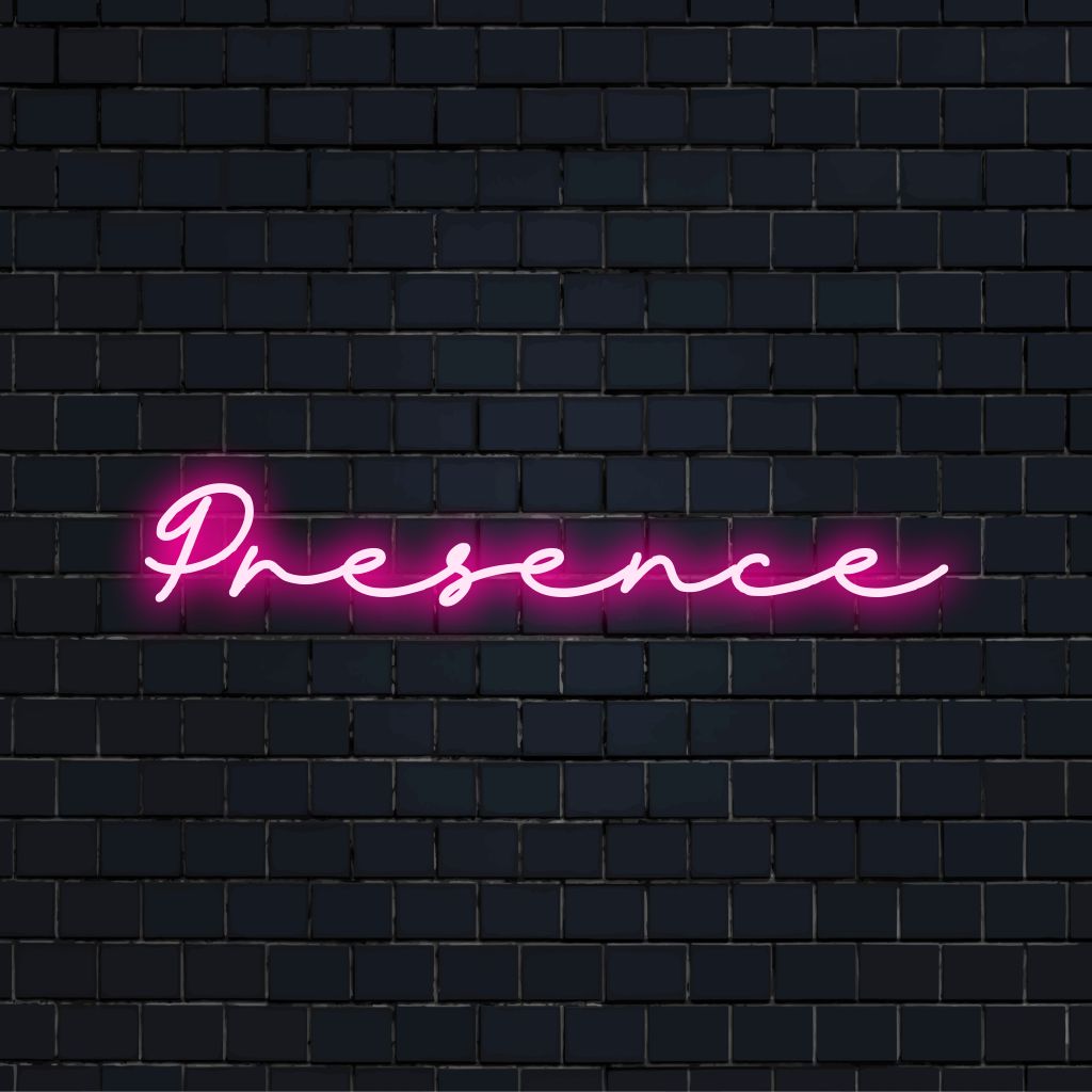 Presence Neon Sign, glowing lettering against black brick wall