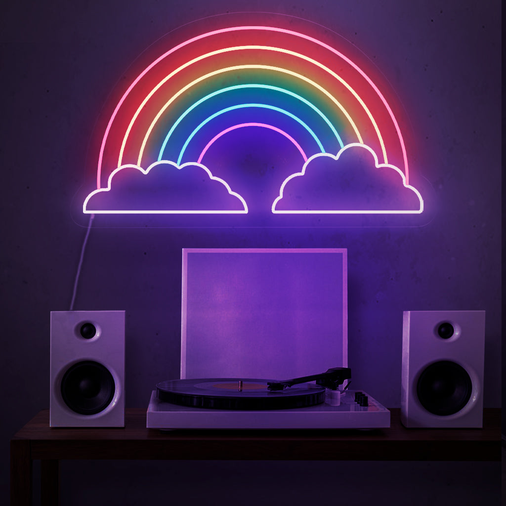 A captivating neon sign featuring a radiant rainbow positioned between two fluffy clouds