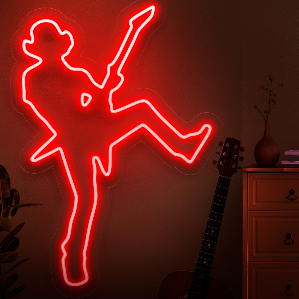 A dynamic neon sign featuring the silhouette of a rock star, capturing the energy and charisma of a live music performance.