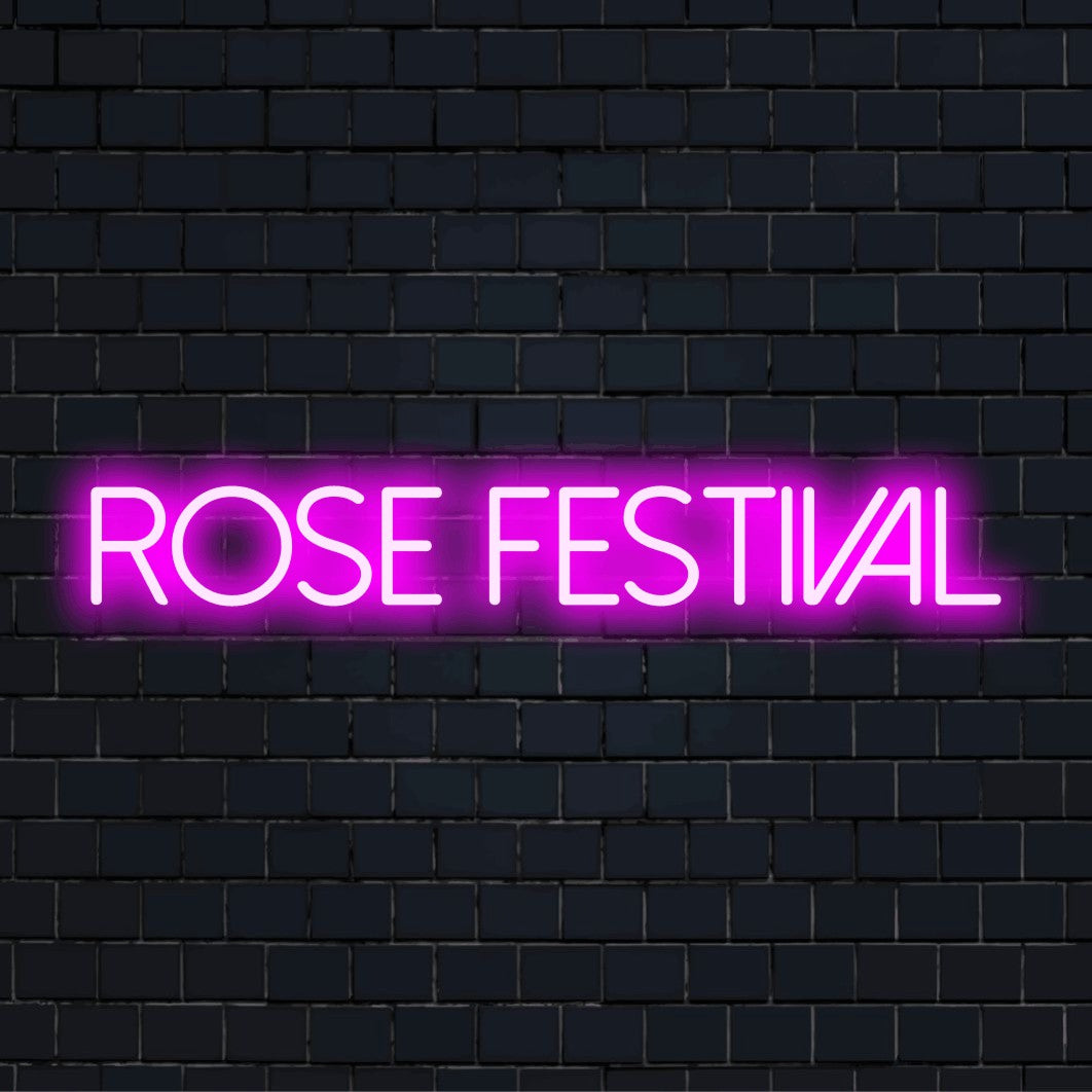 Rose Festival Neon Sign, soft neon glow against brick backdrop