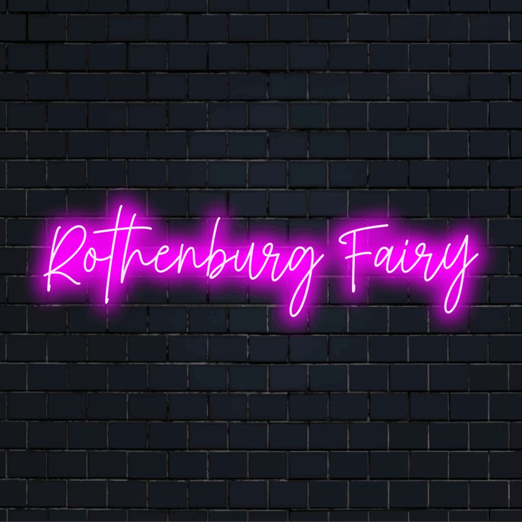 Rothenburg Fairy LED Neon Sign, bright LED glow against black brick wall