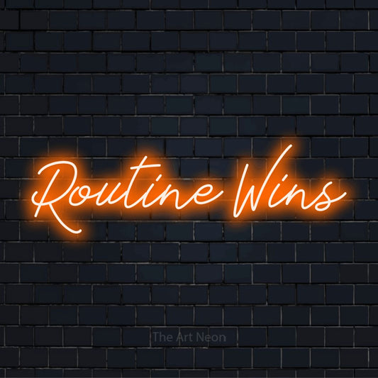 "Routine Wins" neon text design on a black brick wall