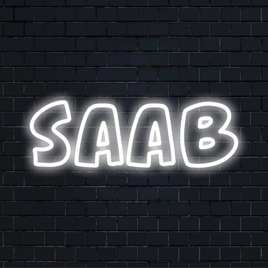 Saab Neon Light with glowing lettering against black brick wall