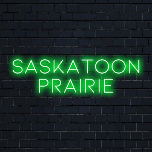 Saskatoon Prairie LED Neon Sign, glowing neon text on dark brick wall