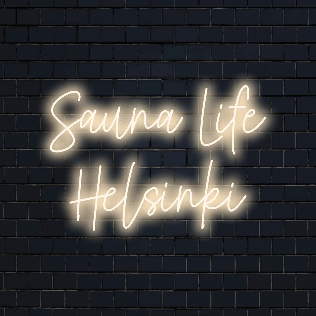 Sauna Life Helsinki Neon Sign, bright LED glow on black brick background