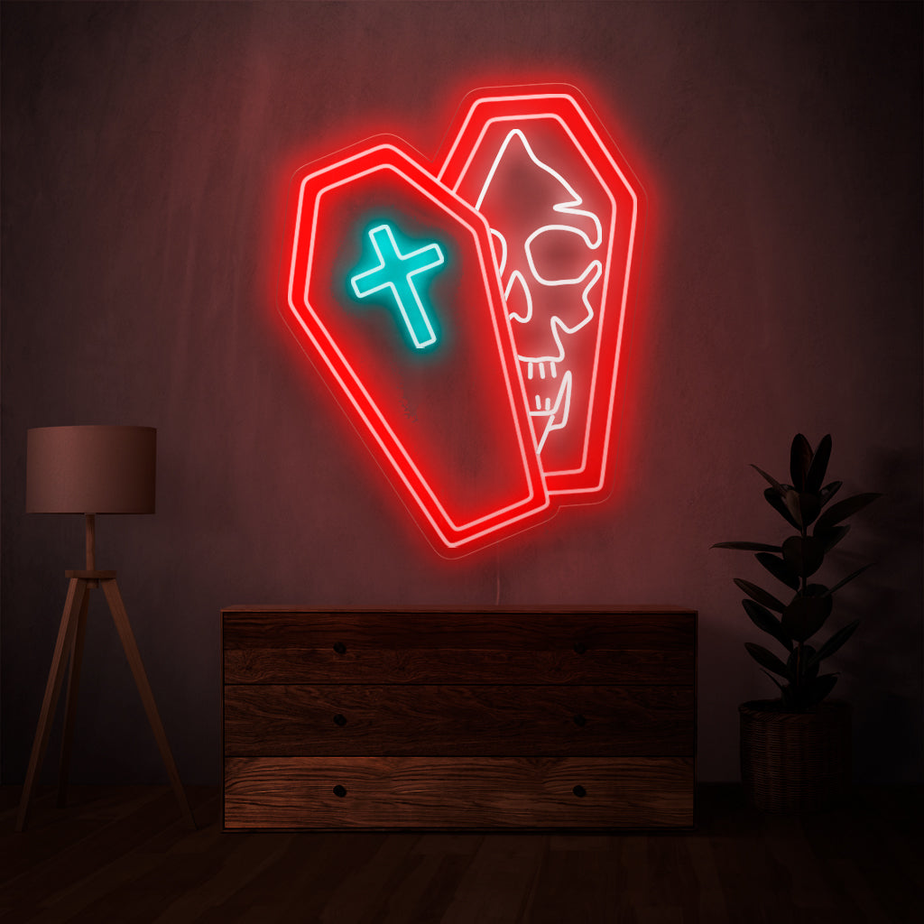 The skull in a coffin neon sign is a macabre addition to spooky-themed decor, emanating an eerie and captivating light.