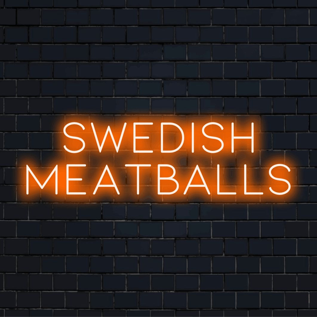 Swedish Meatballs Neon Light with bright neon lettering on dark brick background