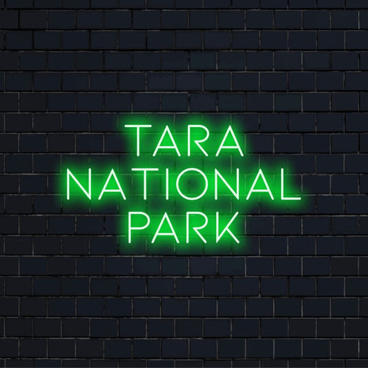 Tara National Park LED Neon Sign, bright LED glow on dark brick background