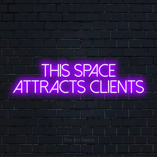 "This Space Attracts Clients" glowing LED neon sign on a black brick wall