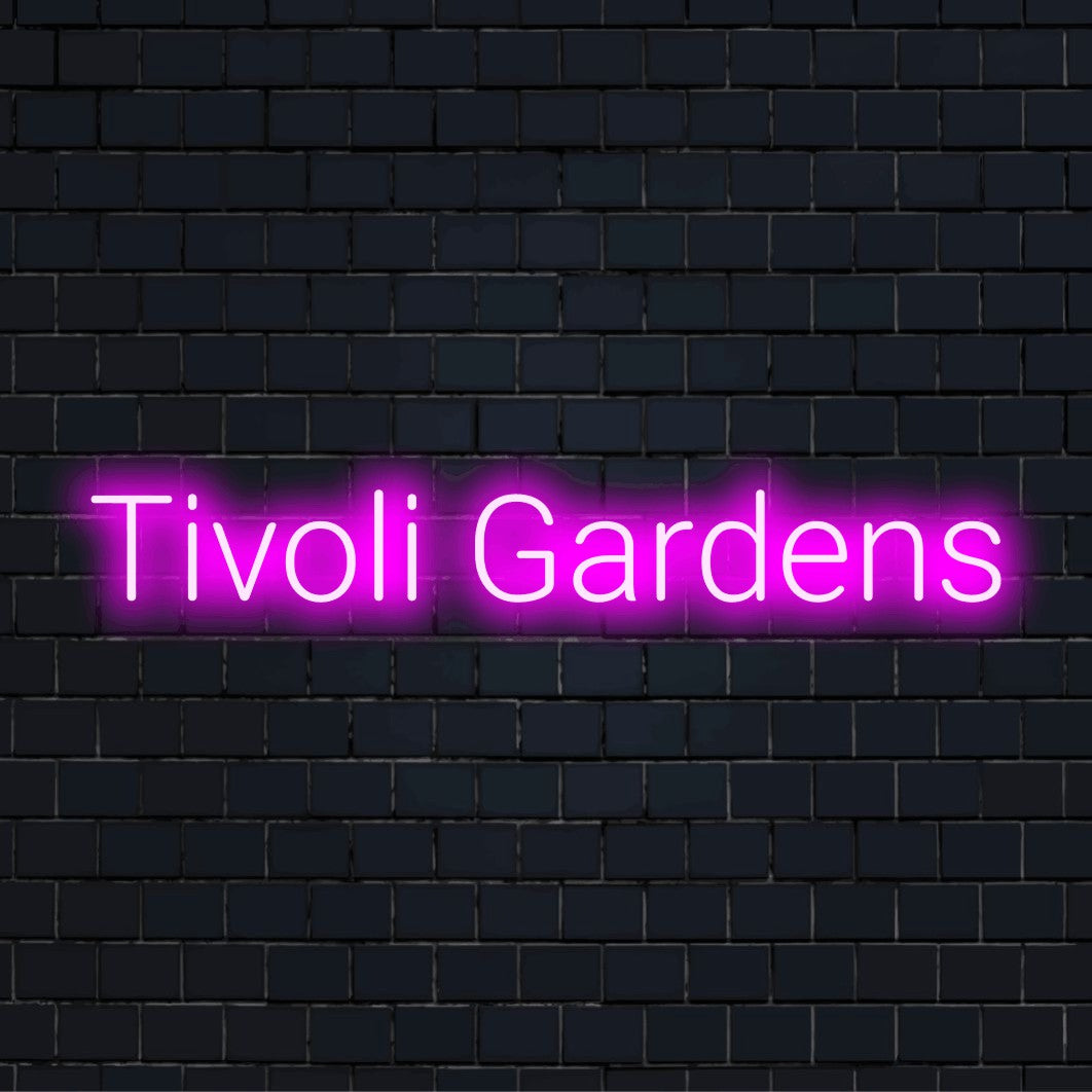 Tivoli Gardens Neon Sign, glowing wall decor against brick backdrop