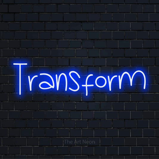 "Transform" text design with neon effect on a black brick wall