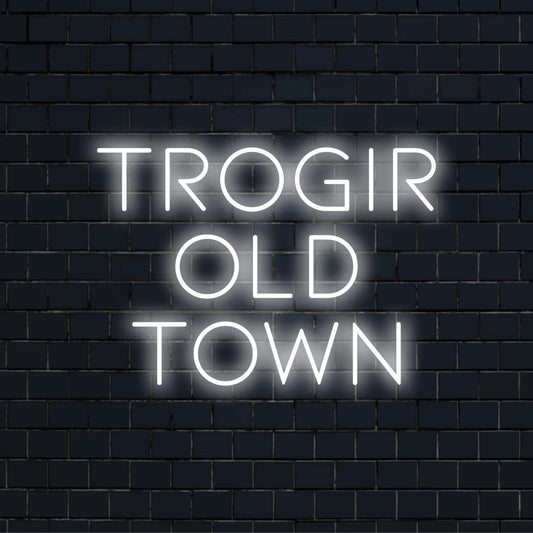 Trogir Old Town Neon Sign, glowing lettering against brick backdrop