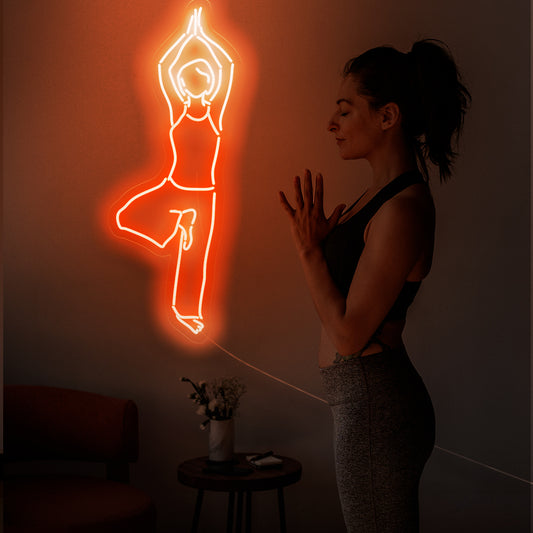 The yoga neon sign is a calming addition to zen decor, promoting mindfulness and emitting a soothing light.